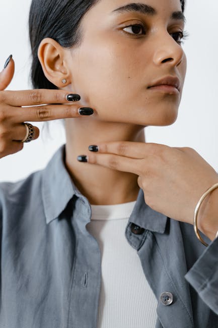 close up hands performing gentle circular eye massage technique with relaxed facial expression