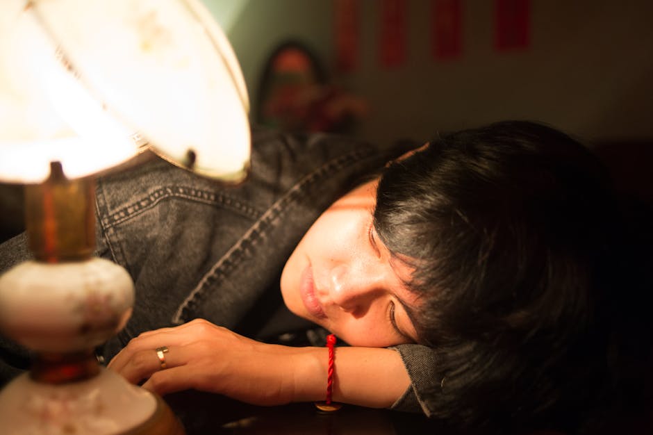 peaceful woman with closed eyes enjoying relaxation moment in comfortable home setting